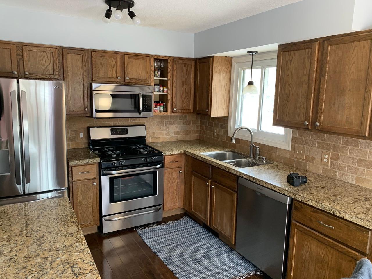 A dated kitchen before cabinet refacing