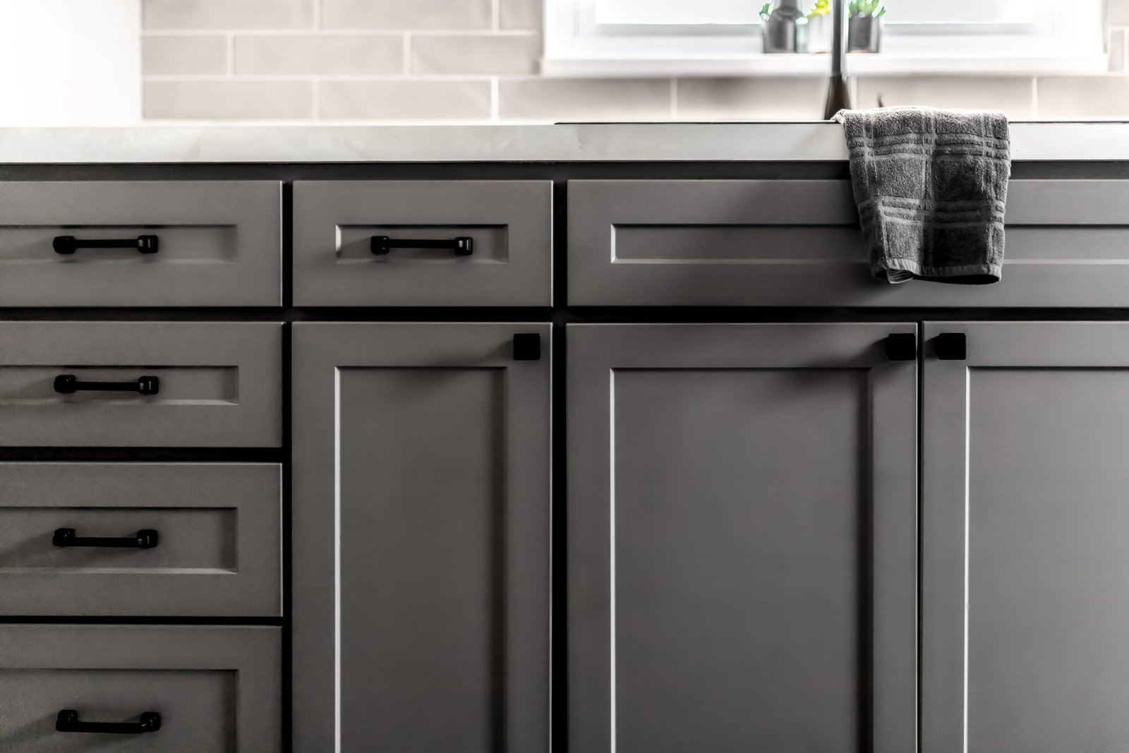 A refaced kitchen with light cabinets